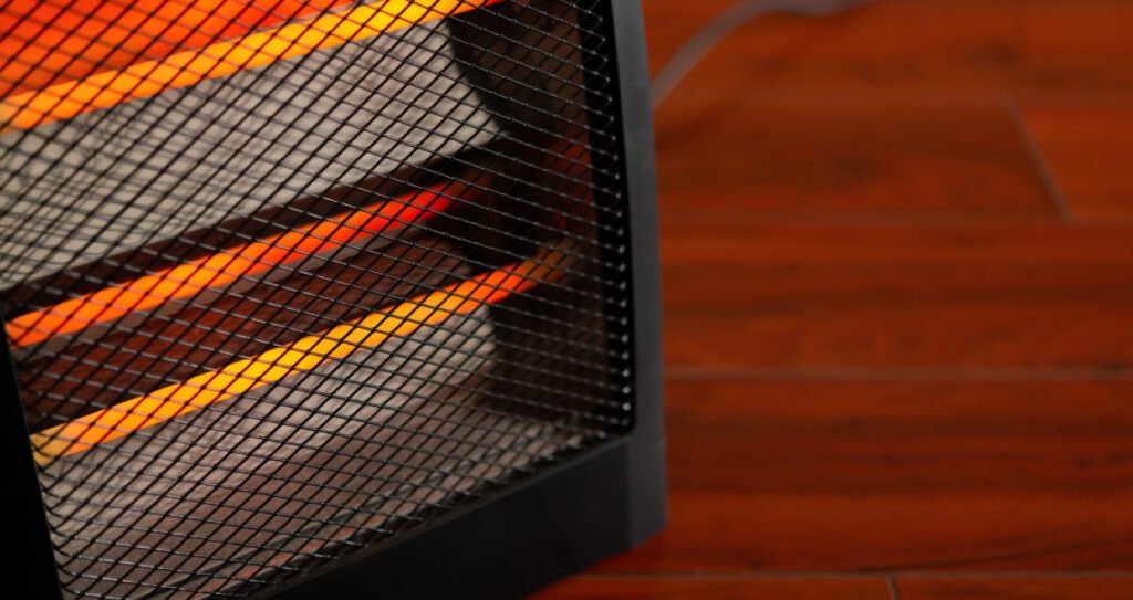 electric heater working in a room with copy space