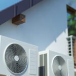 Two air compressors on house