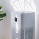 air purifier a living room, air cleaner removing fine dust in home