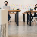 Air purifier in modern office for fresh air and removal dust PM