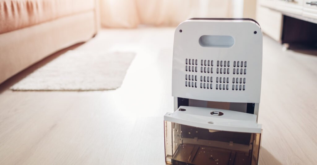 Changing water container of dehumidifier at home