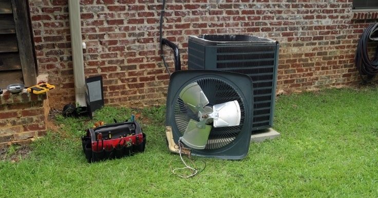 Outdoor ac unit being worked on