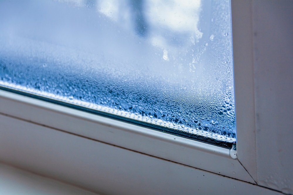 A,Fragment,Of,A,Plastic,Window,With,Condensation,Of,Water